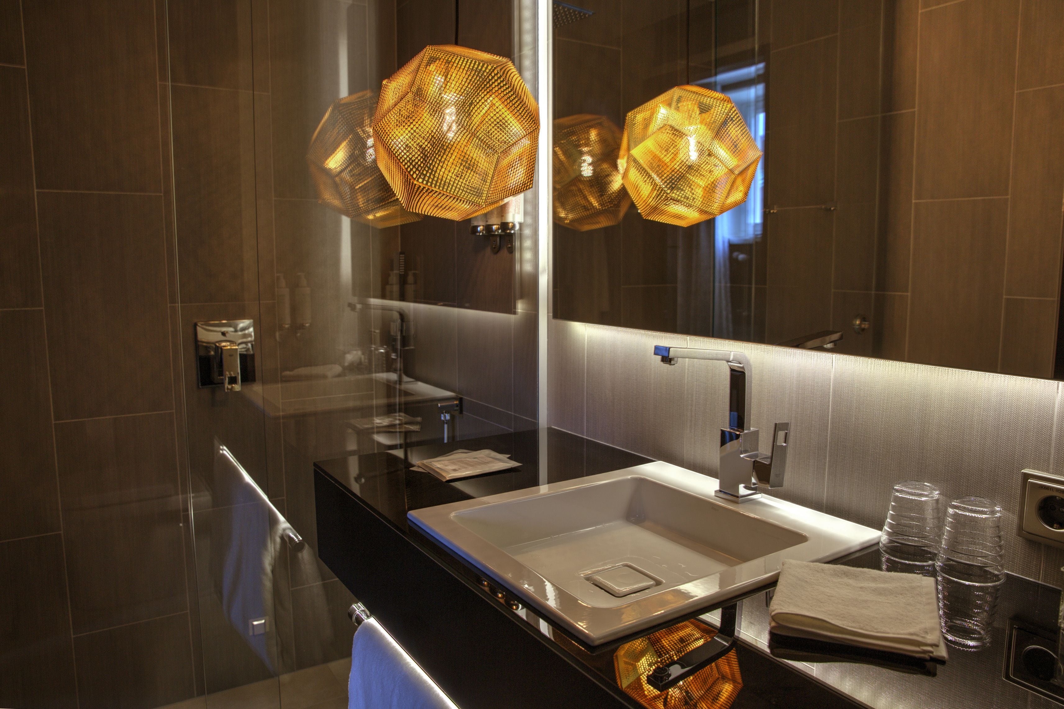 shower, rainfall showerhead, hair dryer, towels