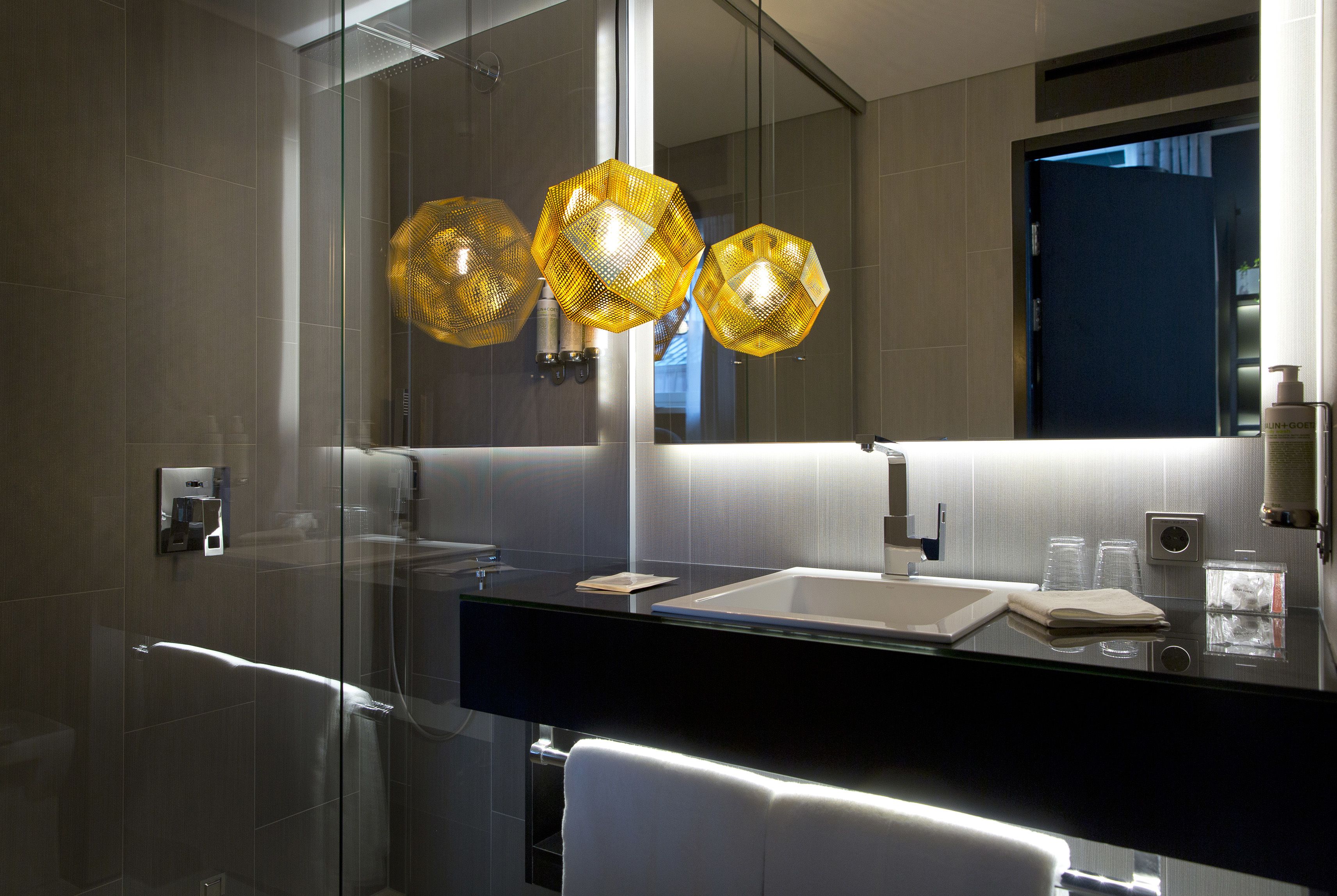 shower, rainfall showerhead, hair dryer, towels