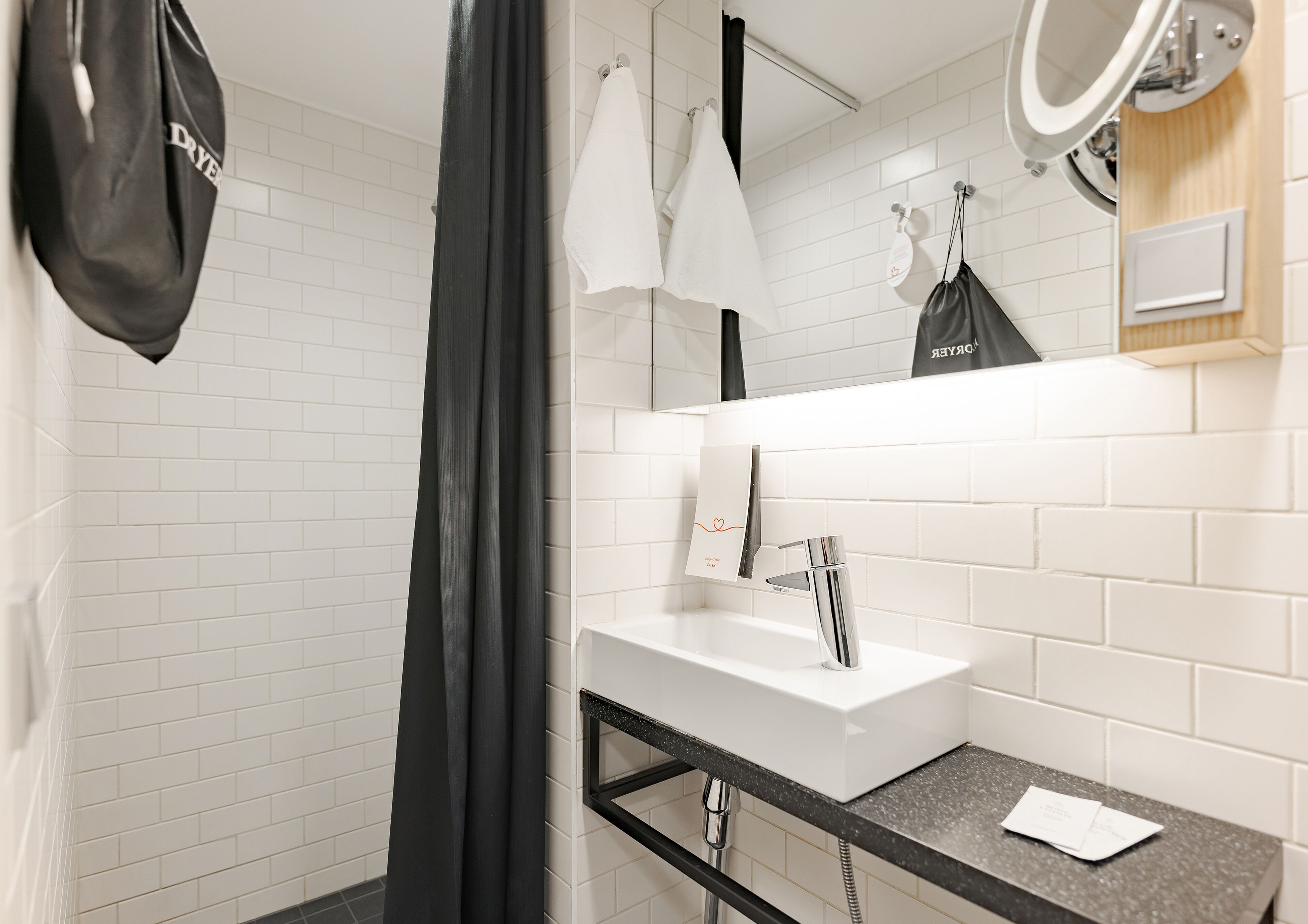 superior room | bathroom | shower, hair dryer, towels