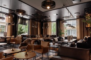 Enjoy a casual dining experience in a stylish and inviting space with comfortable seating options.