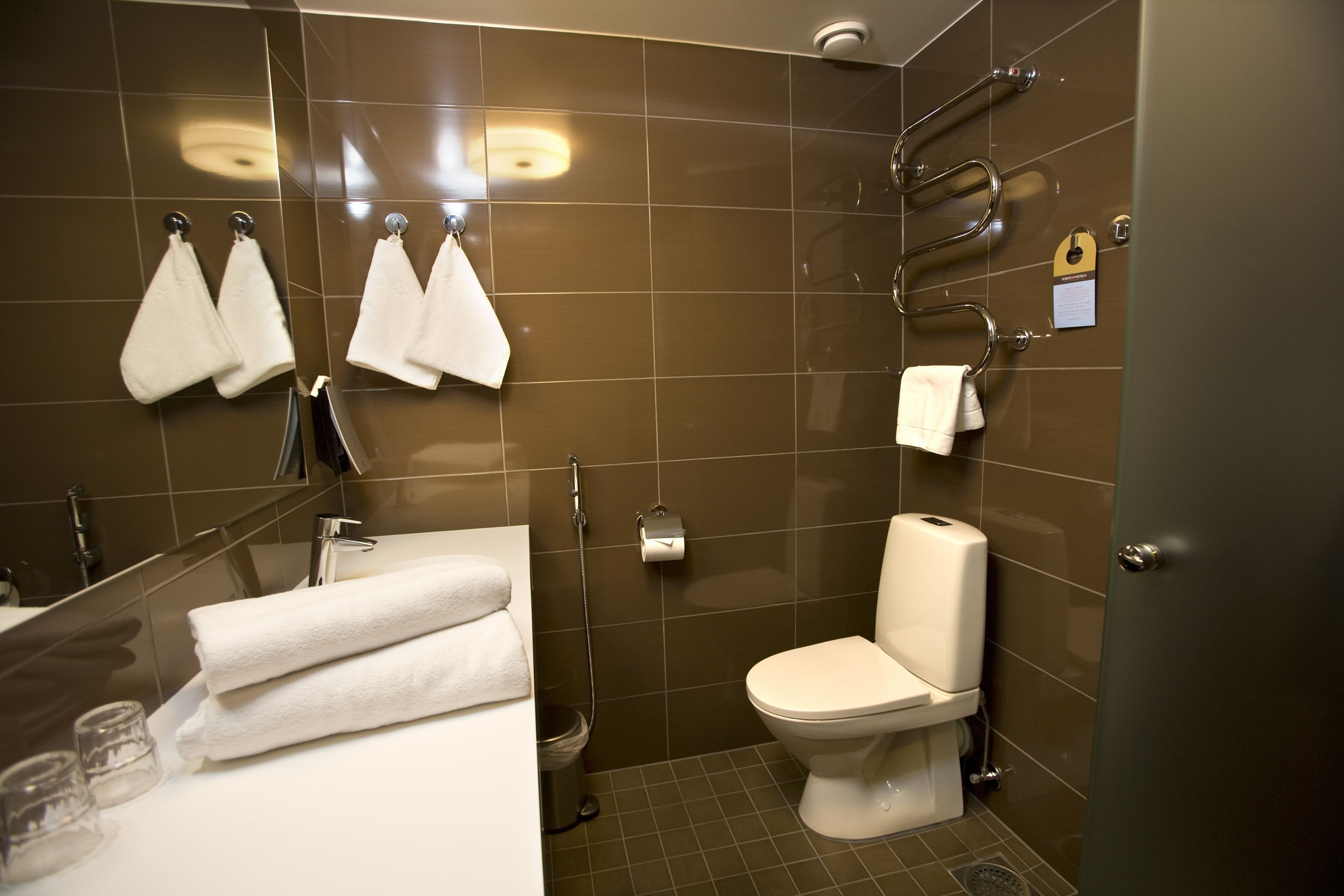 standard twin room | bathroom | shower, hair dryer, towels
