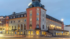 A historic hotel with a prominent tower and multiple windows. - First Hotel Statt Örnsköldsvik (Ornskoldsvik)