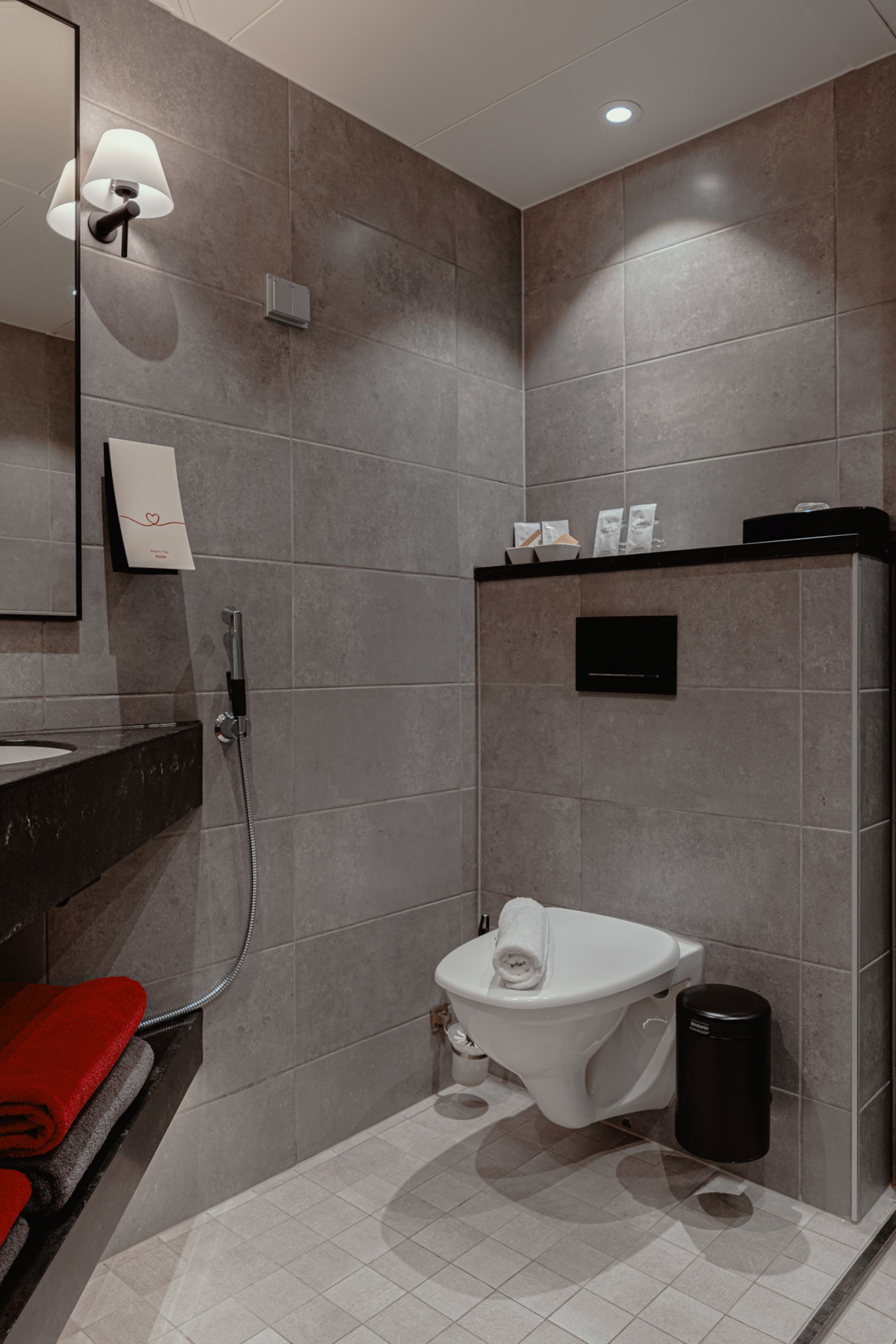 shower, hair dryer, bidet, towels