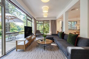 Family Apartment, Multiple Beds, Garden View, Garden Area (Three Bedroom Garden Apartment) | Living area | LCD TV