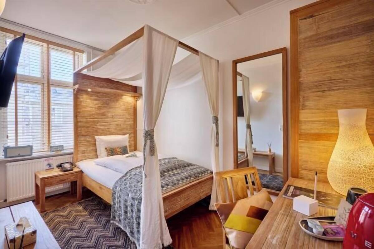 Biancheria da letto di alta qualità, una cassaforte in camera