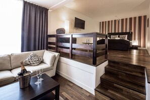 Junior Room | In-room safe, desk, laptop workspace, blackout drapes