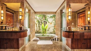 Separate bathtub and shower, deep-soaking bathtub, designer toiletries