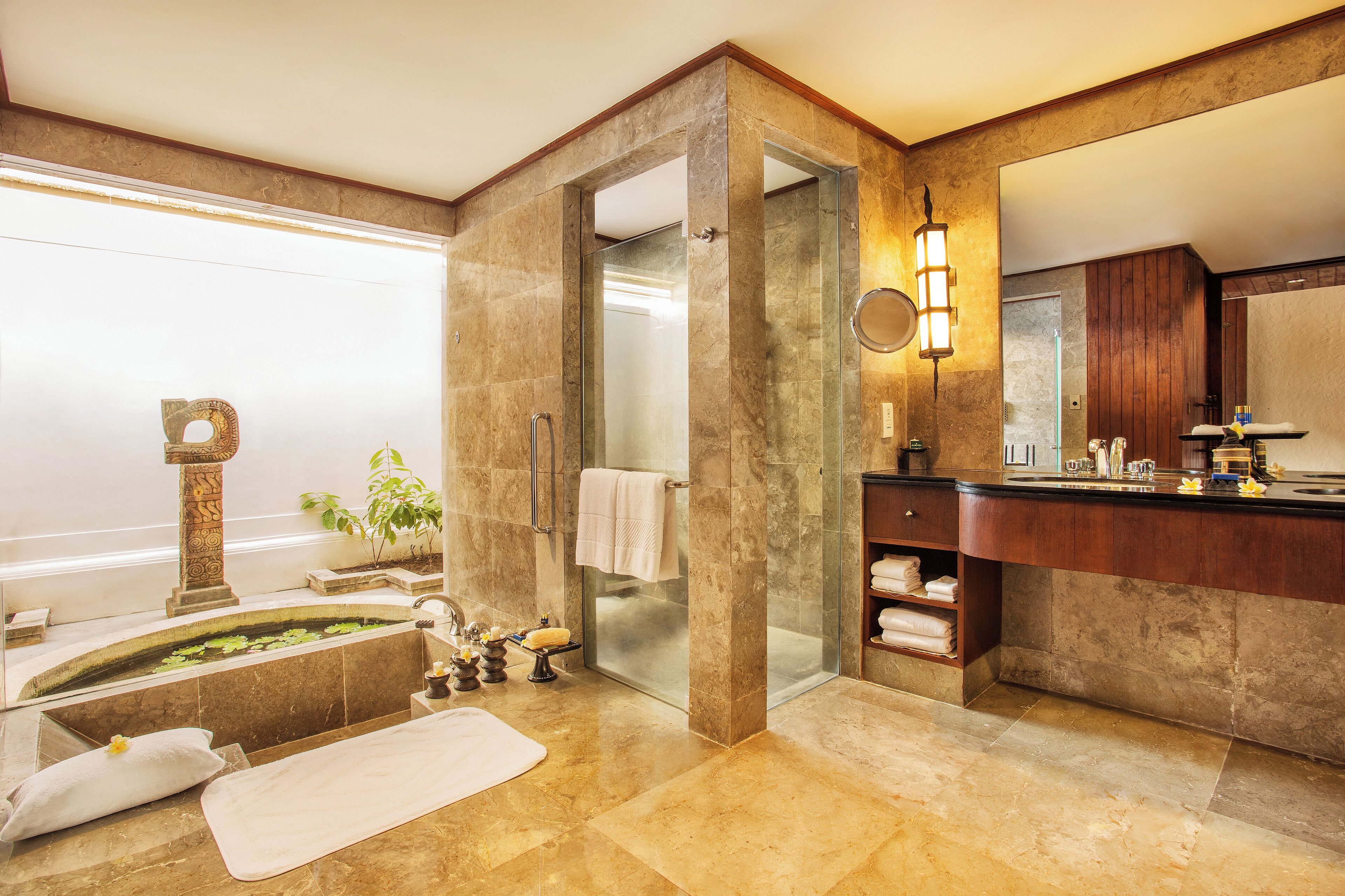 separate bathtub and shower, deep-soaking bathtub, designer toiletries