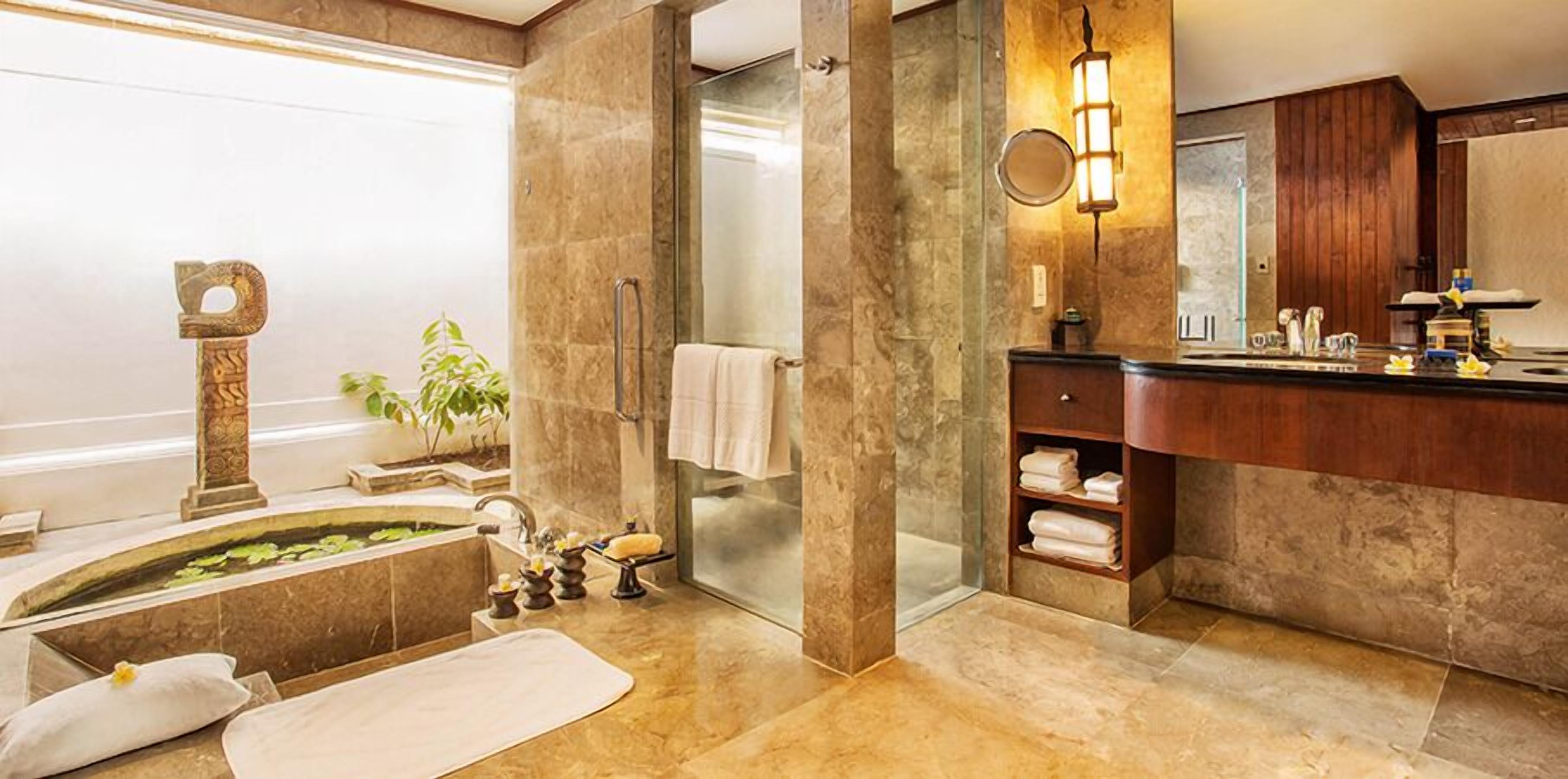 luxury room, ocean view (pavilion) | bathroom | separate bathtub and shower, deep-soaking bathtub, designer toiletries