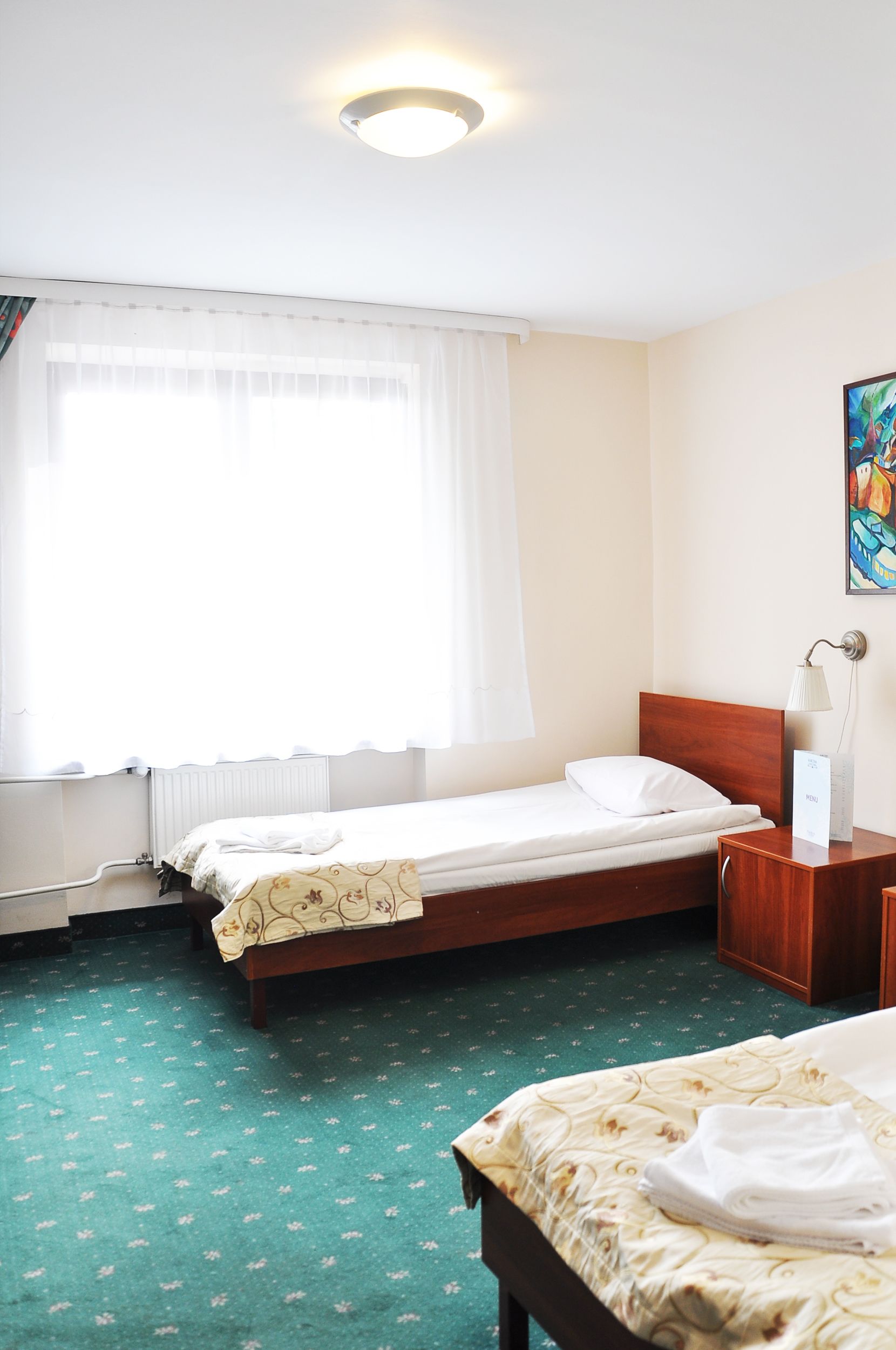 triple room | pillow-top beds, in-room safe, iron/ironing board, cots/infant beds