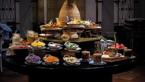 A buffet table with various dishes and condiments. - Grand Swiss-Belhotel Melaka (Malacca City)