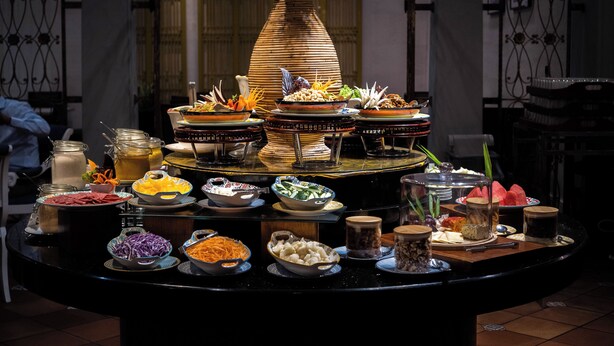 A buffet table with various dishes and condiments. - Grand Swiss-Belhotel Melaka (Malacca City)