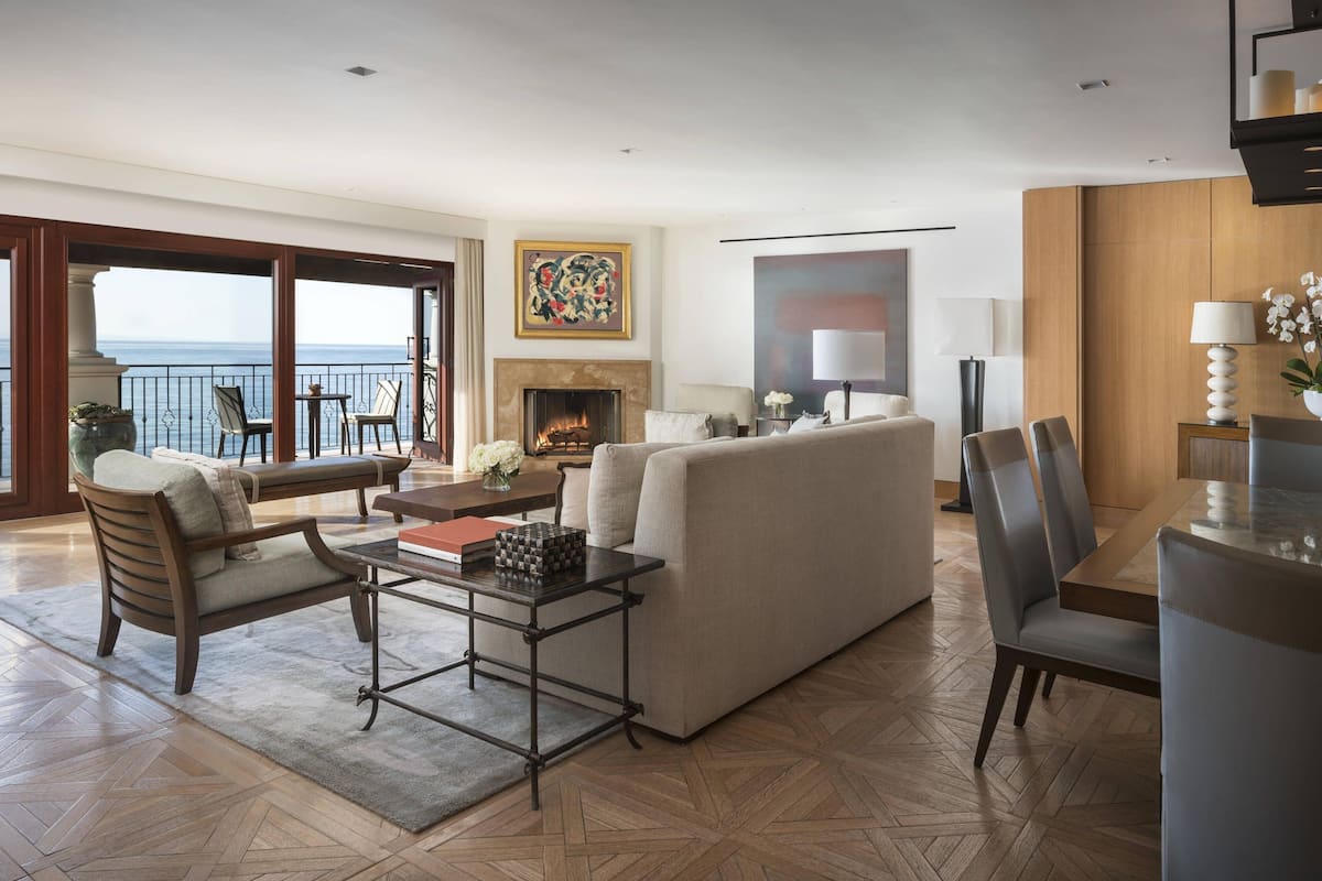 Club Suite, 2 Bedrooms (Penthouse Suite, Balcony) | Living room | 48-inch LED TV with cable channels, TV, pay films
