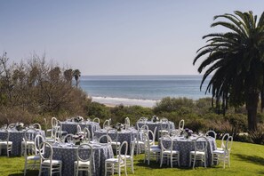 Dine al fresco with a scenic ocean view.