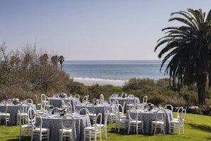 Dine al fresco with a scenic ocean view.
