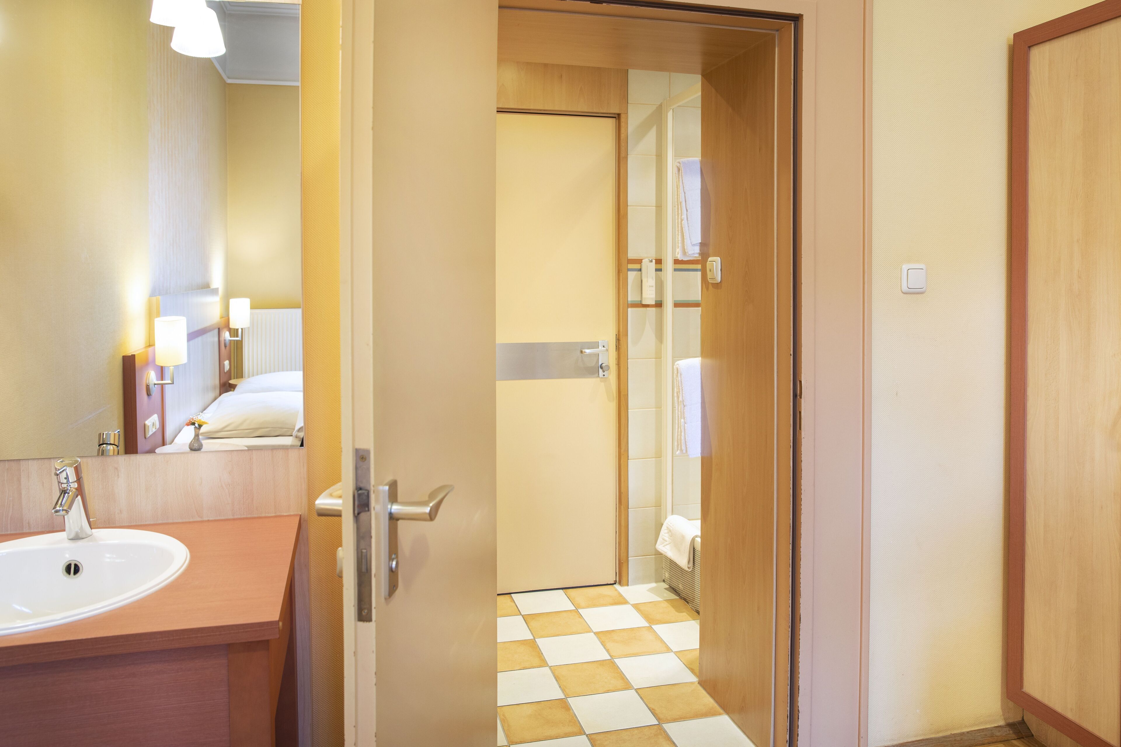 economy double room | bathroom | eco-friendly toiletries, hair dryer, towels