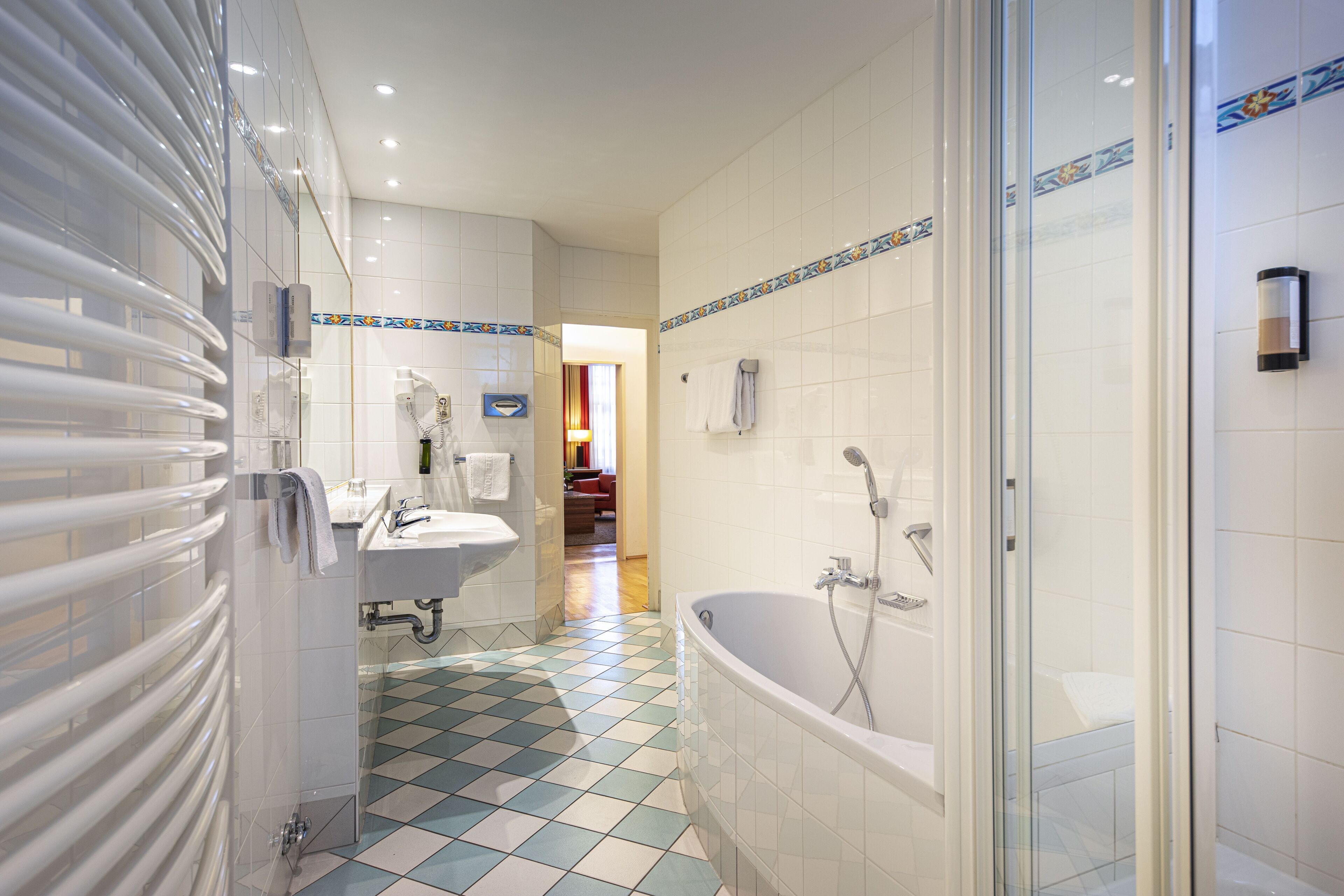 suite | bathroom | eco-friendly toiletries, hair dryer, towels