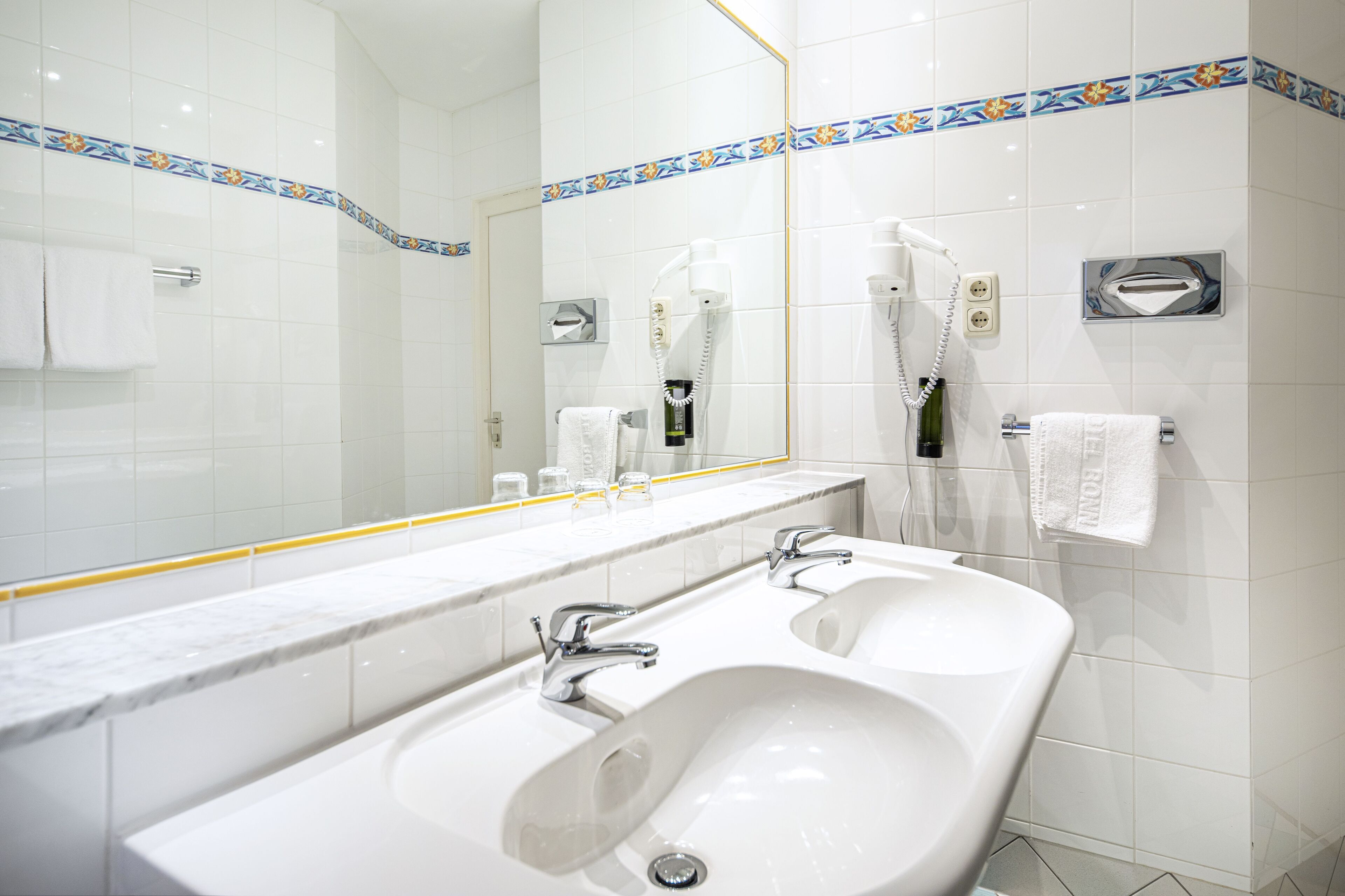 suite | bathroom | eco-friendly toiletries, hair dryer, towels