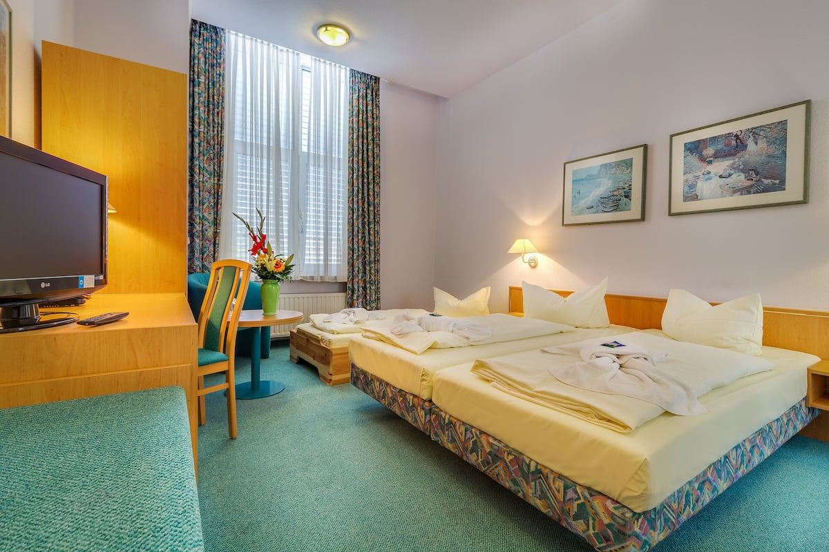 Triple Room | Premium bedding, desk, free WiFi, bed sheets