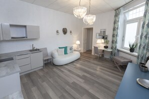 Standard-Doppelzimmer | Wohnbereich | Flachbildfernseher