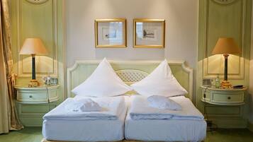 Hypo-allergenic bedding, down duvets, free minibar, in-room safe