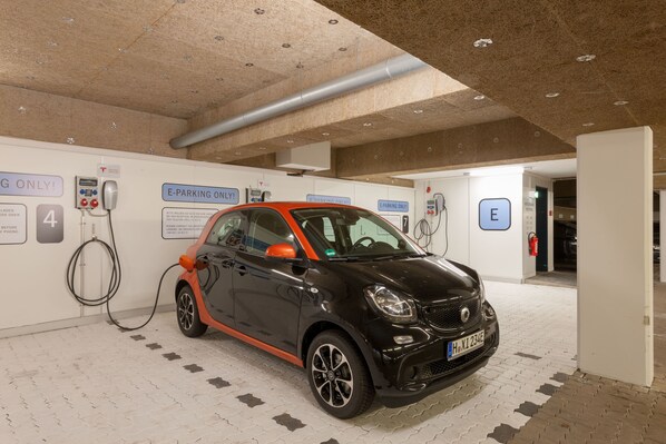 Electric vehicle charging station available for guests.