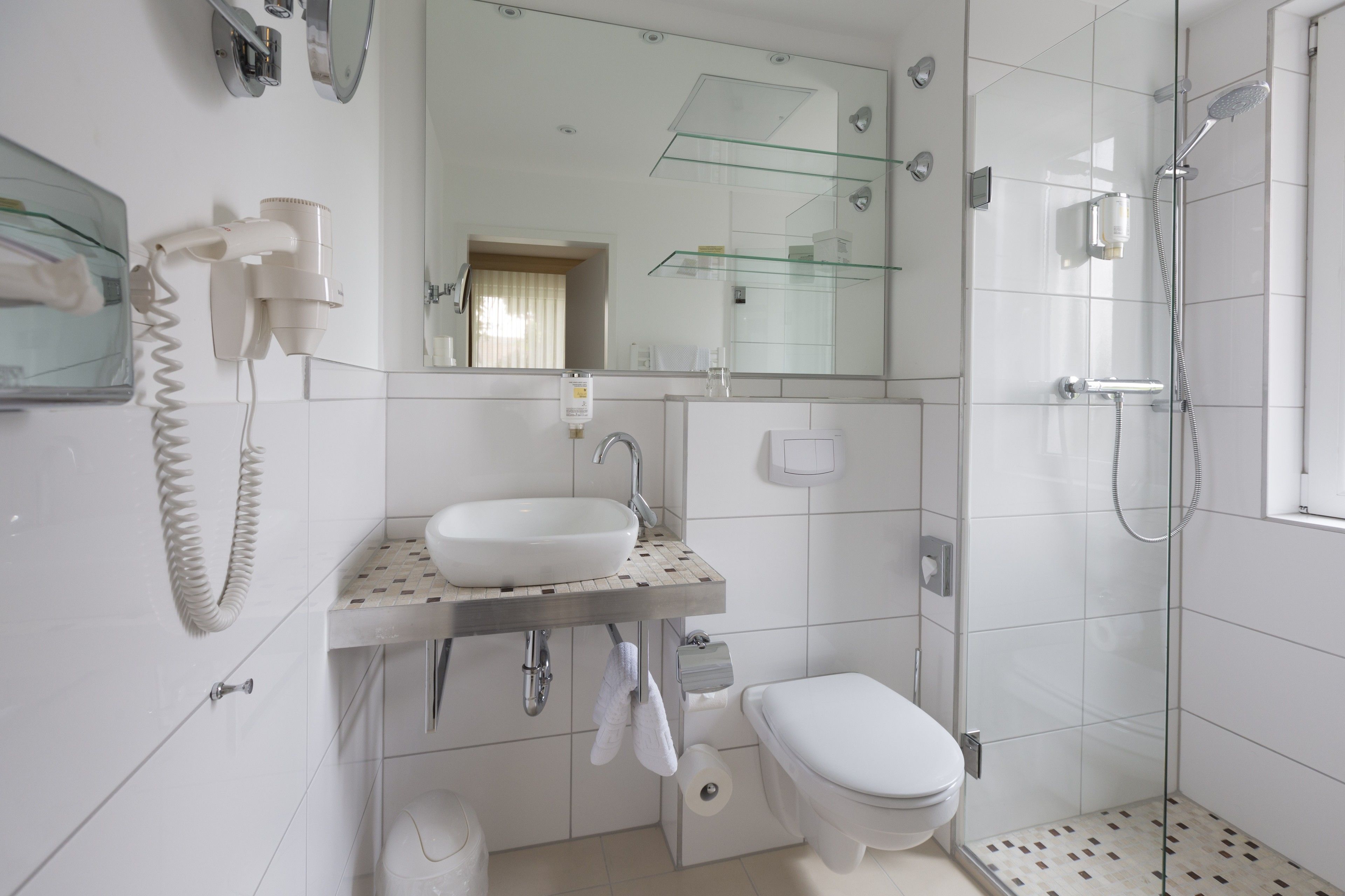 shower, free toiletries, hair dryer, towels