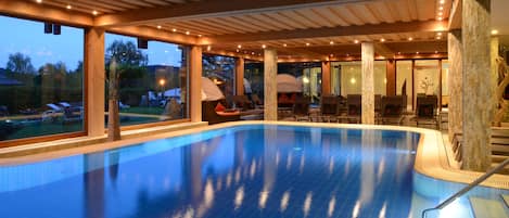 Indoor pool, outdoor pool, pool umbrellas, pool loungers