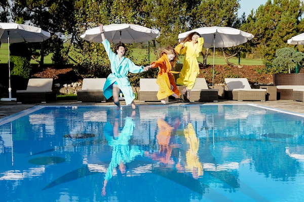 Indoor pool, outdoor pool, pool umbrellas, pool loungers