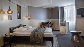Honeymoon Studio Suite | 1 bedroom, hypo-allergenic bedding, in-room safe, individually decorated