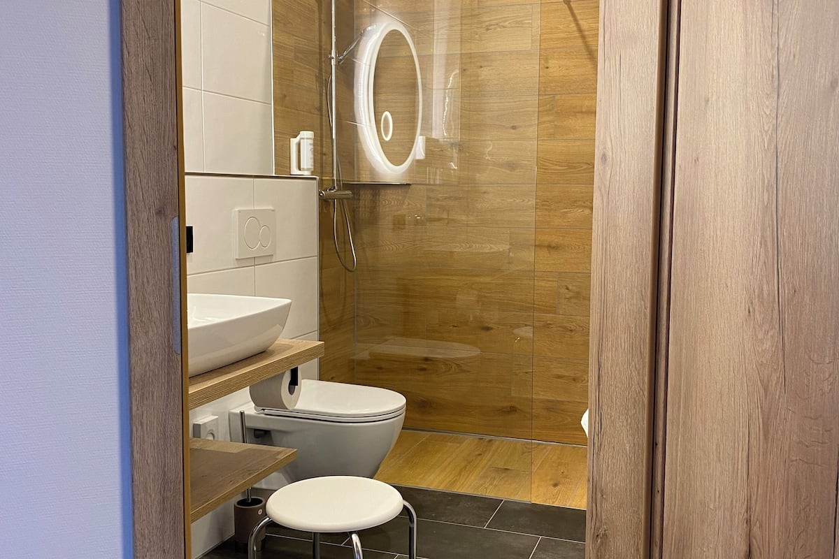 superior triple room, air conditioning | bathroom | hair dryer, towels, soap, shampoo