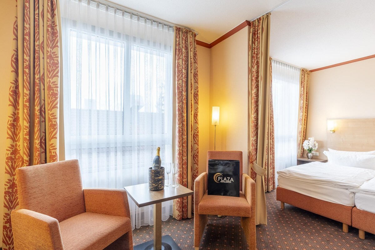 Hypoallergeen beddengoed, een kluis op de kamer, een bureau