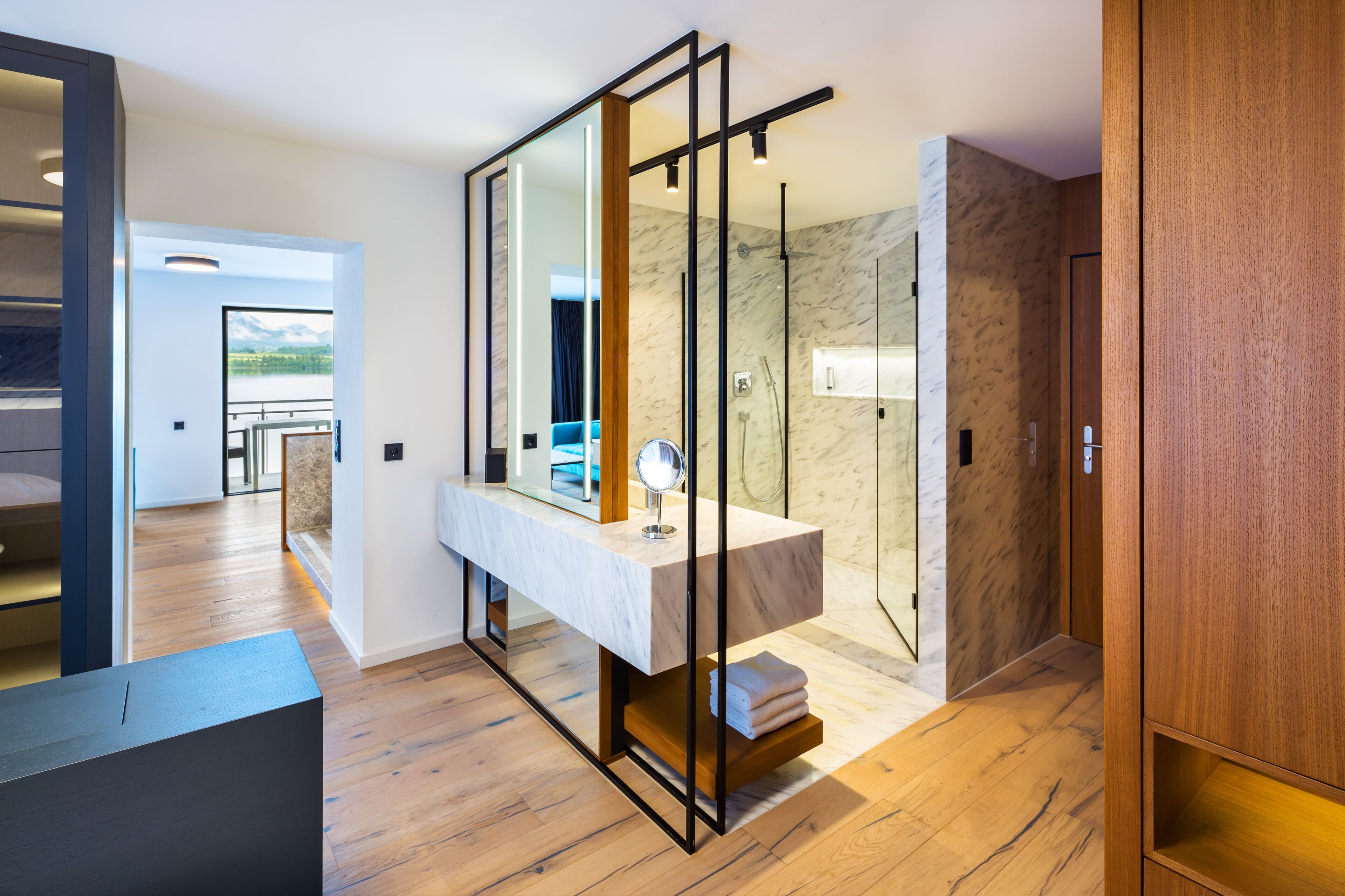 hair dryer, bathrobes, slippers, towels