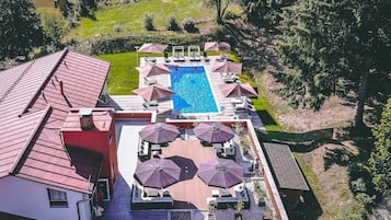 Indoor pool, seasonal outdoor pool, pool umbrellas, sun loungers