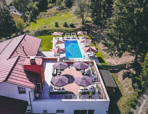 Indoor pool, seasonal outdoor pool, pool umbrellas, sun loungers