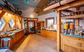 Enjoy cooking in this kitchen with a unique curved ceiling and ample counter space.
