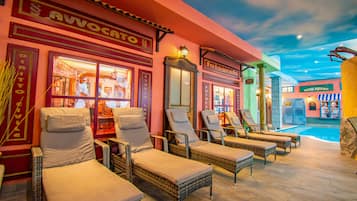 Indoor pool, seasonal outdoor pool, pool umbrellas, pool loungers