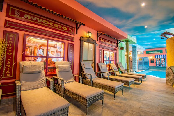 Indoor pool, seasonal outdoor pool, pool umbrellas, sun loungers
