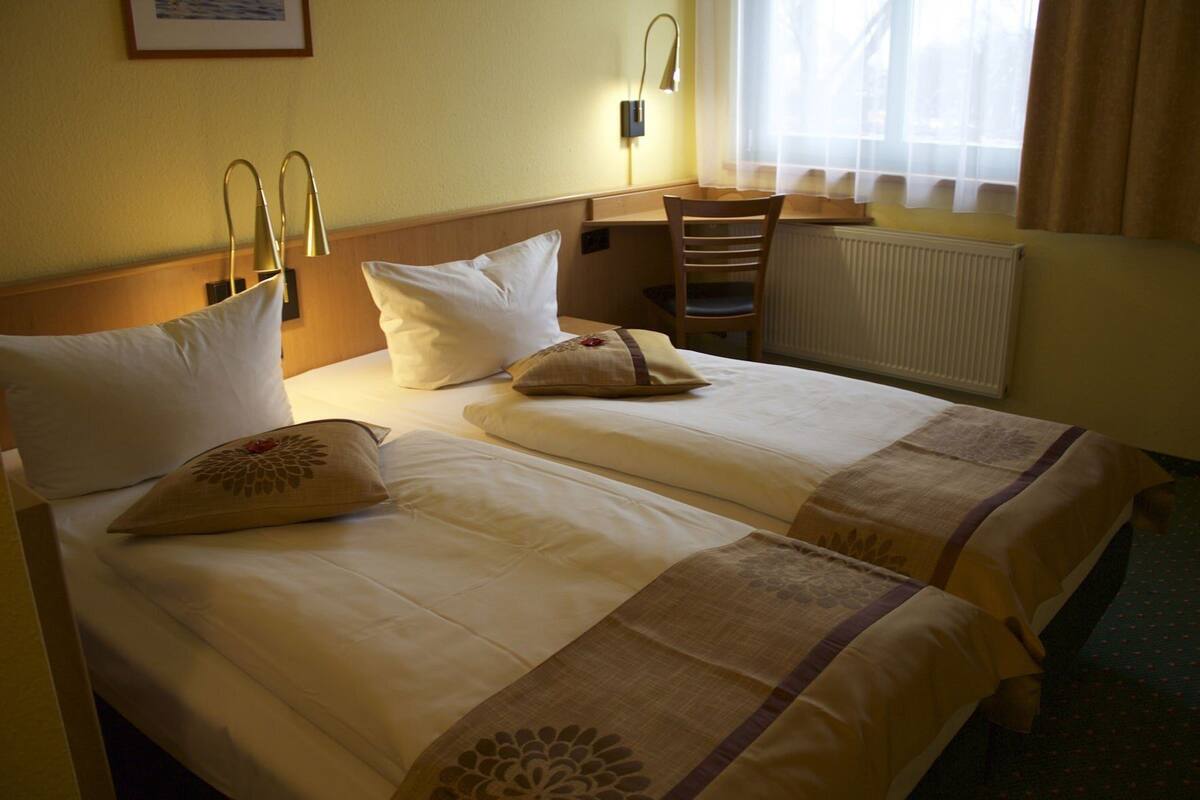 Desk, blackout curtains, soundproofing, bed sheets