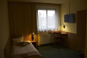 Desk, blackout curtains, soundproofing, bed sheets