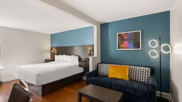 Junior Suite, 1 King Bed, Non Smoking (with Sofabed) | Pillowtop beds, desk, laptop workspace, iron/ironing board