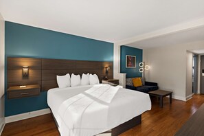 Junior Suite, 1 King Bed, Non Smoking (with Sofabed) | Pillowtop beds, desk, laptop workspace, iron/ironing board