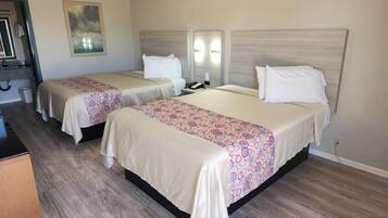 Habitación clásica, 2 camas Queen size | 1 habitación, wifi gratis y ropa de cama