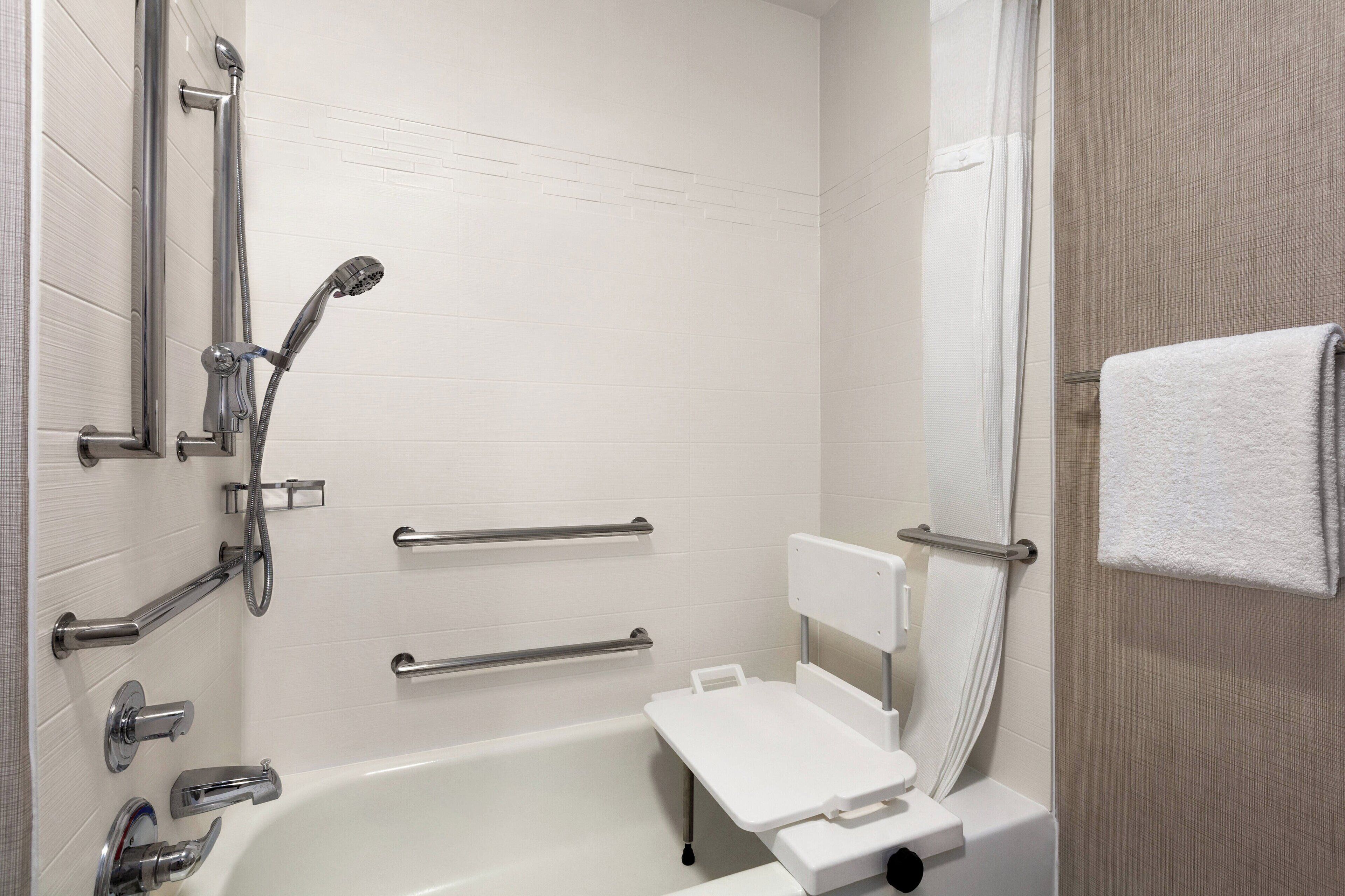 combined shower/bathtub, free toiletries, hair dryer, towels