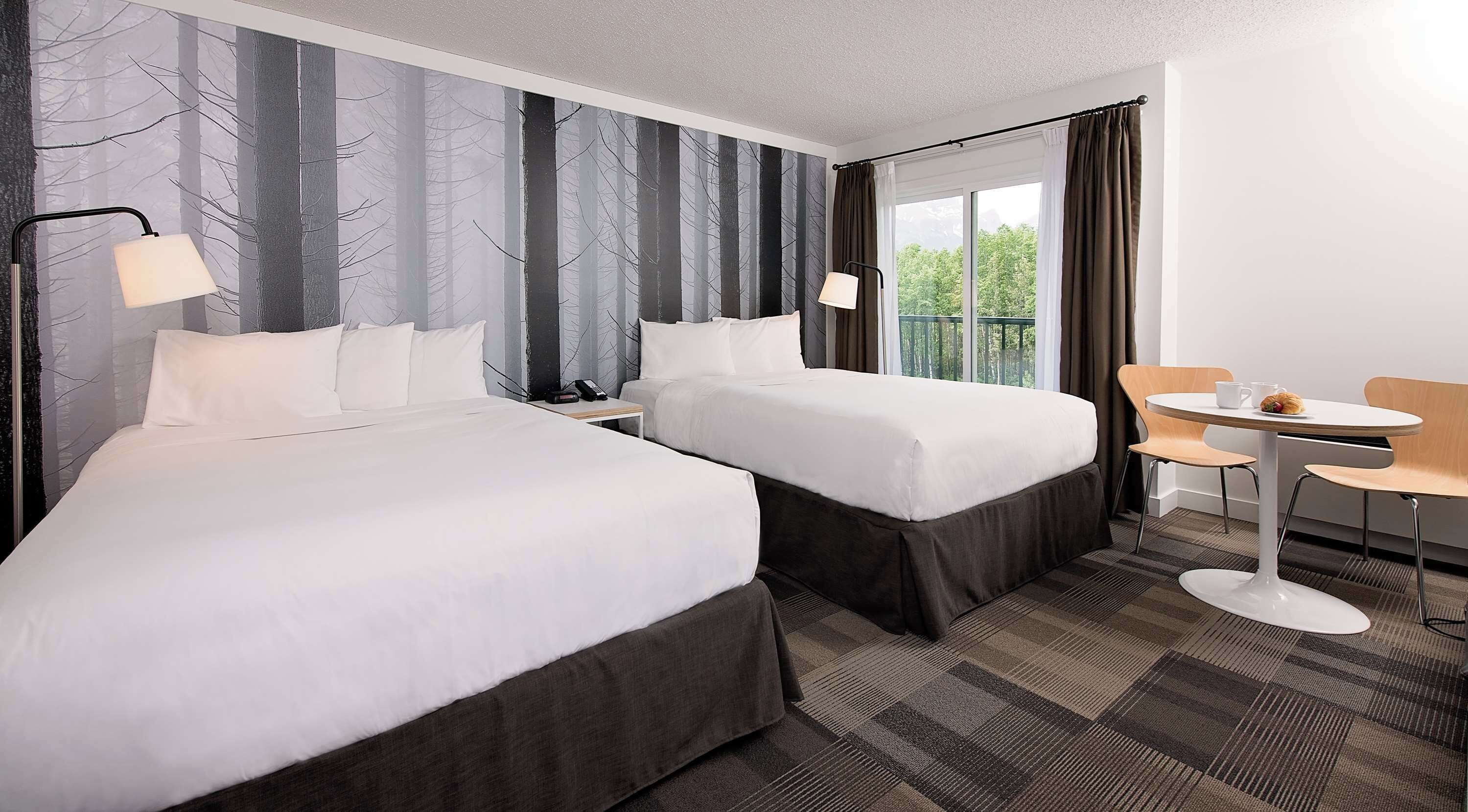 Comfort Room, 2 Queen Beds (Coast Two Queens) | Premium bedding, pillow-top beds, iron/ironing board, free WiFi
