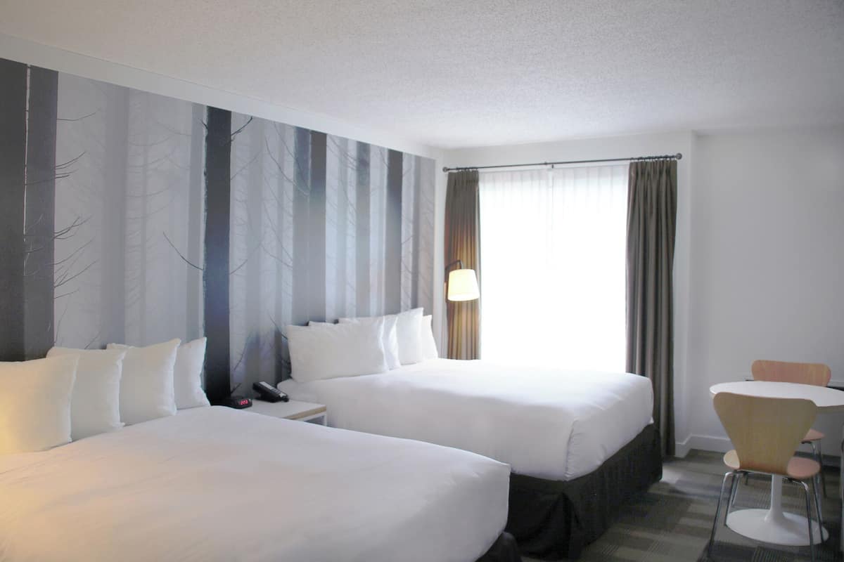 Superior Room, 2 Queen Beds (Coast Two Queens with Patio) | Premium bedding, pillow-top beds, iron/ironing board, free WiFi