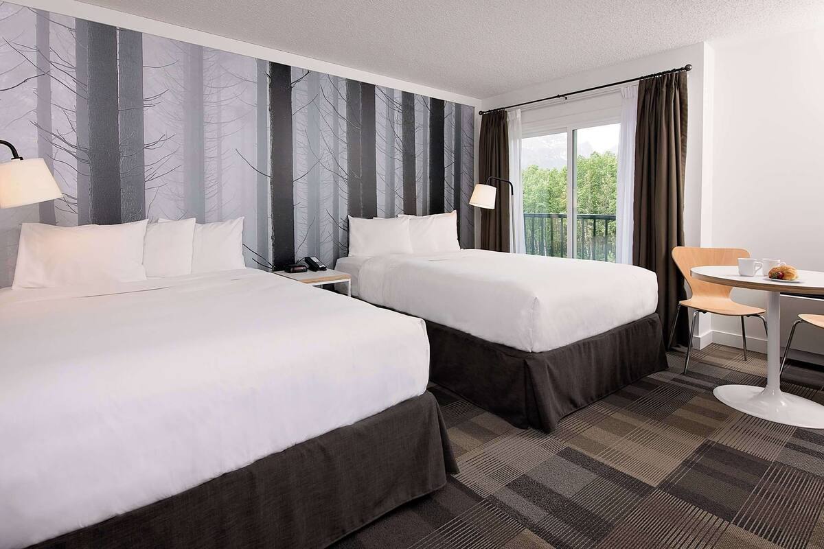 comfort room, 2 queen beds (coast two queens) | premium bedding, pillow-top beds, iron/ironing board, free wifi