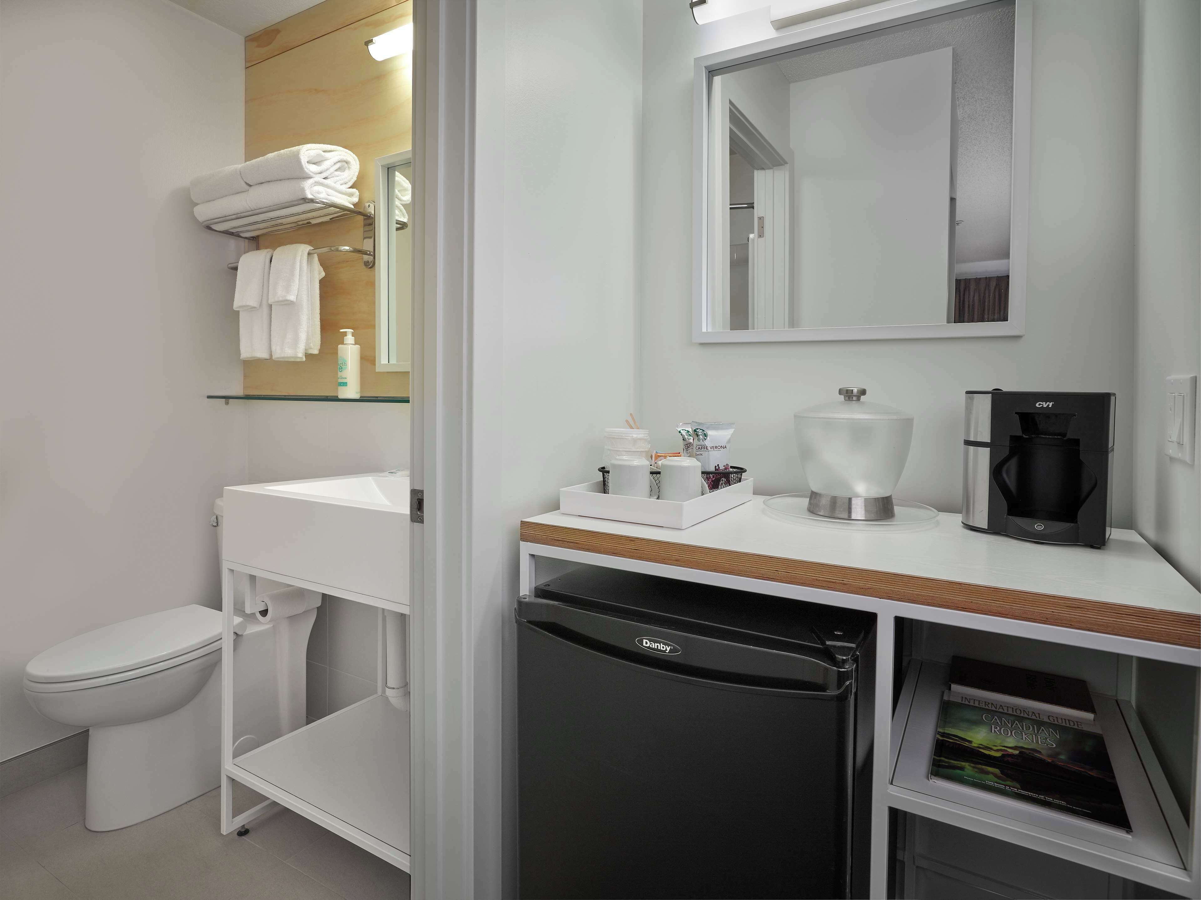 eco-friendly toiletries, hair dryer, towels, soap