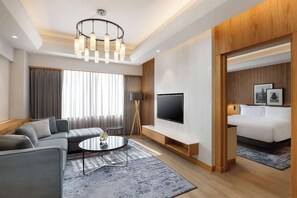 Apartment | Living room | 42-inch LCD TV with satellite channels, TV, heated floors - Radisson Hotel Kathmandu (Kathmandu)