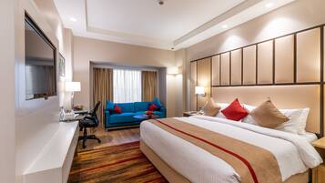 Colchones con pillow-top, minibar y caja de seguridad en la habitación